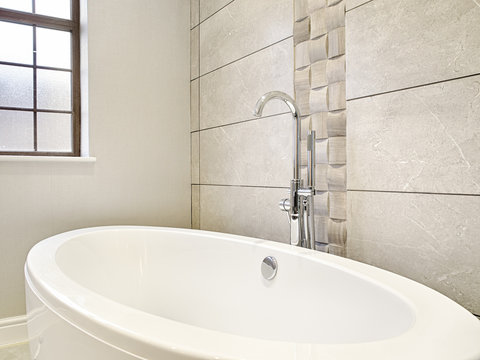 Interior design detail of a Luxury bath tub and faucet