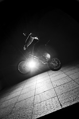 Man jumping with the bike © biolphoto