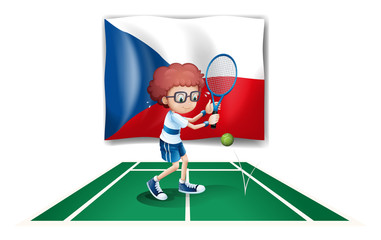 A boy playing tennis in front of the Czech Republic flag