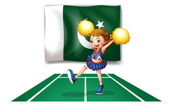 A cheerleader dancing in front of the Pakistan flag