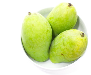 Green mango isolated on a white background