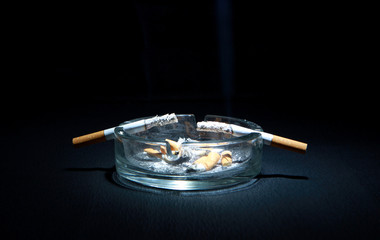 Ashtray And Two Cigarette