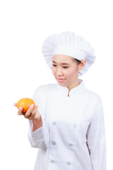 Chef showing orange. Isolated on white background with clipping