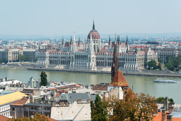 Fototapeta na wymiar View of Hungarian parliament building with Danube river