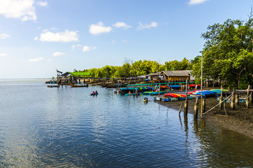 Fototapeta na wymiar Fishing village and marina in Thailand
