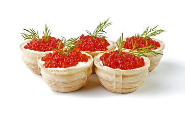Red caviar in tartlet, isolated over white