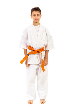 Boy in a kimono over white background