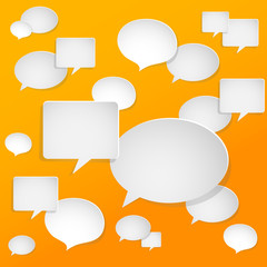Abstract white paper speech bubbles on orange background