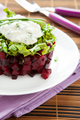 simple salad of cubes beet and arugula