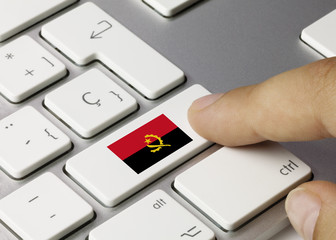 Flag of Angola Keyboard key - obrazy, fototapety, plakaty