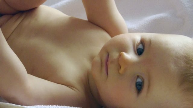 HD720p50 Baby laying on a blanket