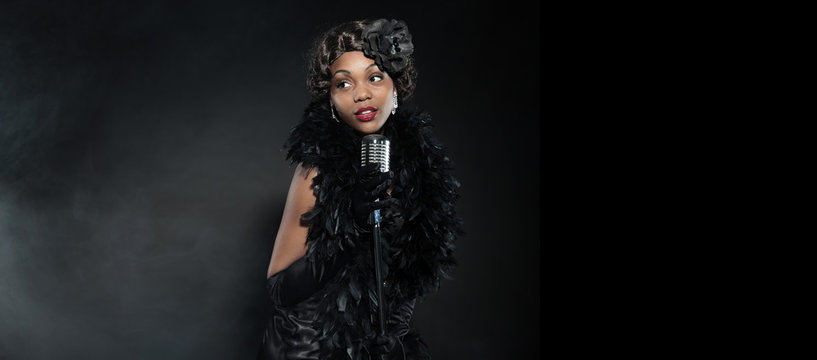 Vintage jazz woman singing. Black african american. Copy space.