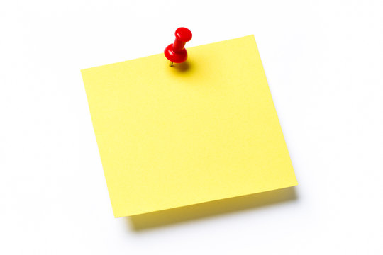 Yellow sticky note isolated on white