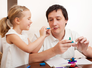 Girl and dad molded from clay toys