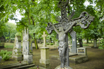 Selective focus on cross on the grave