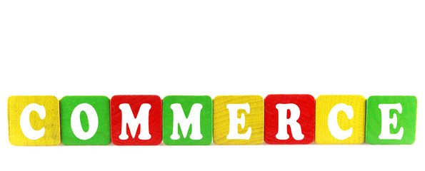 commerce - isolated text in wooden building blocks