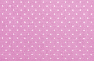 pink polka dot fabric © tashka2000