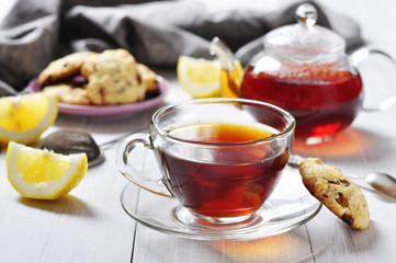 Cup of tea with teapot