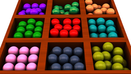 Bolas de colores en caja