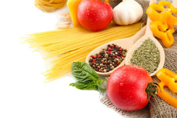 Pasta spaghetti, vegetables and spices, isolated on white
