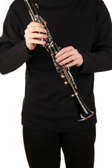 Fototapeta premium Musician playing on clarinet isolated on white