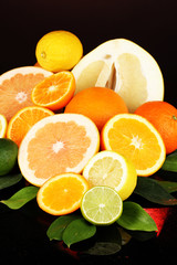 Lots ripe citrus isolated on black