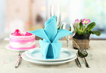 Romantic table serving on bright background