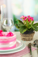 Romantic table serving on bright background