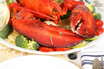 Red lobster on platter on serving table close-up