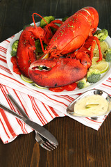 Red lobster on platter on table close-up