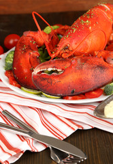 Red lobster on platter on table close-up