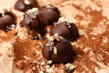 Chocolate candies with nuts, close up