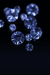 Beautiful shining crystals (diamonds), on black background