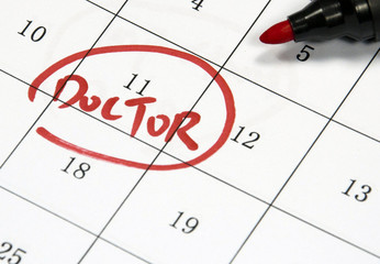 doctor date sign written with pen on paper