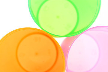 Green, orange and pink cups
