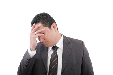 Closeup portrait of a pensive worried businessman with eyes clos