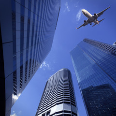 Fototapeta na wymiar Brisbane modern buildings and aircraft