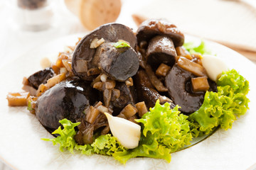 roasted wild cap boletus with garlic and parsnips