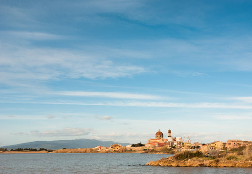 Sardegna,Cabras, stagno e Chiesa di Santa Maria Assunta