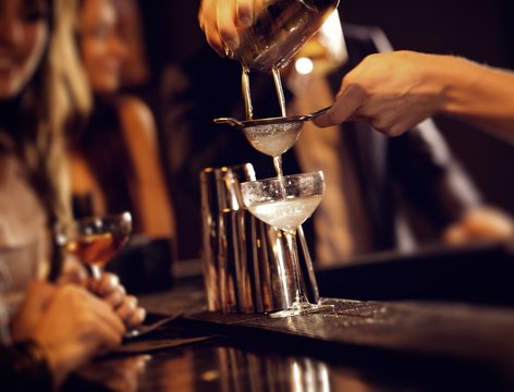 Barman Serving Cocktail Drinks