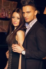 Elegant and Lovely Couple Posing Indoor