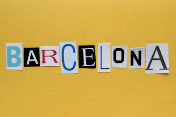 word barcelona on yellow paper background