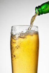 Beer is Pouring into glass