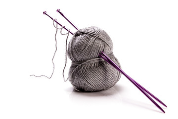 Grey wool and needles