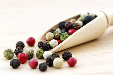 Colorful Peppers Mix in wooden scoop