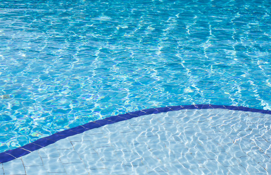 Clear blue water in swimming pool
