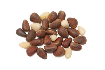 Obraz premium Cedar nuts on white background