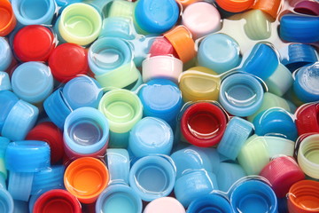 In many colors bottle caps.