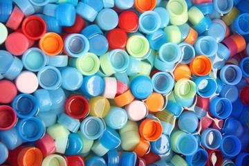 In many colors bottle caps.