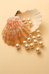 Scattering white pearls in seashell